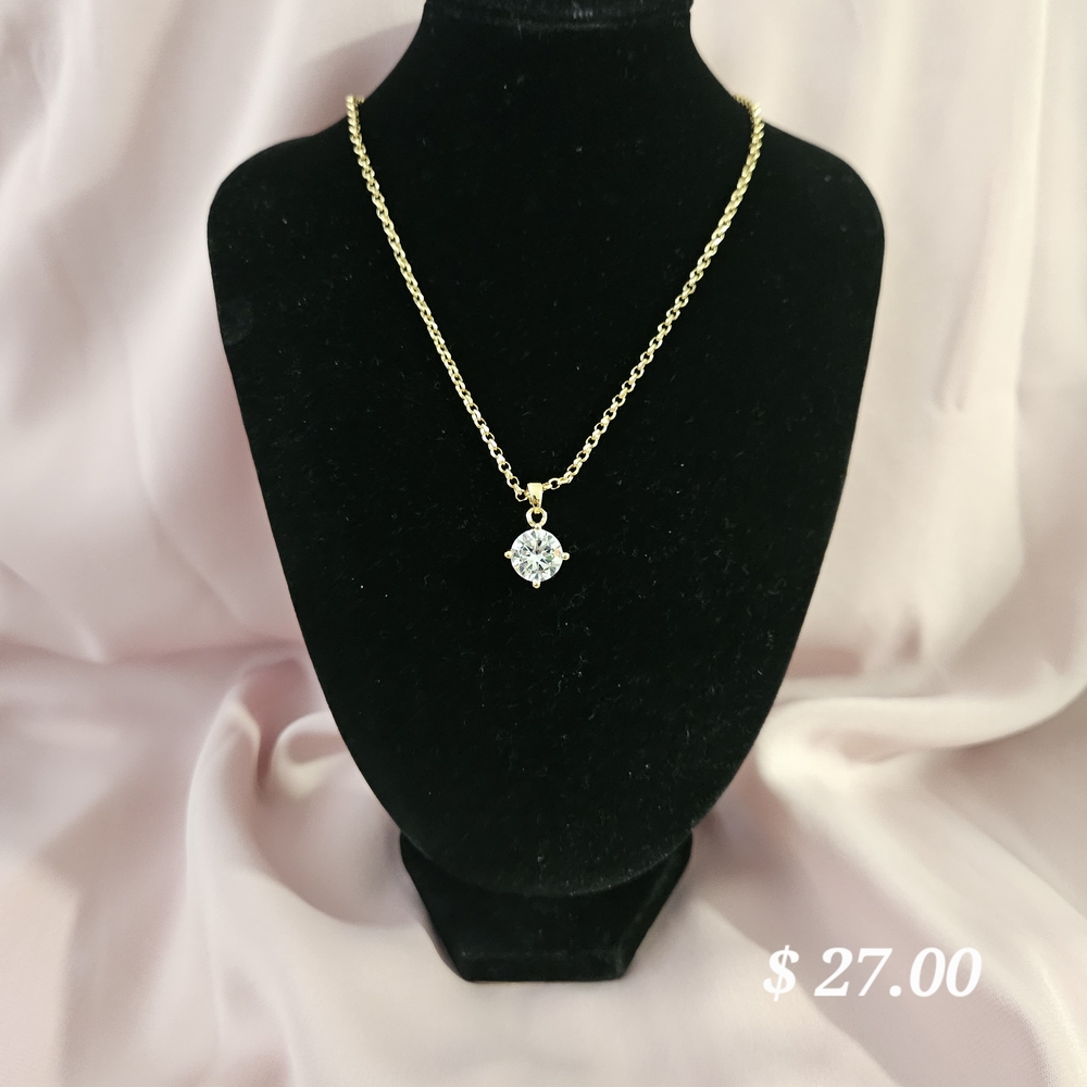 Elegant Gold Necklace with Crystal Pendant